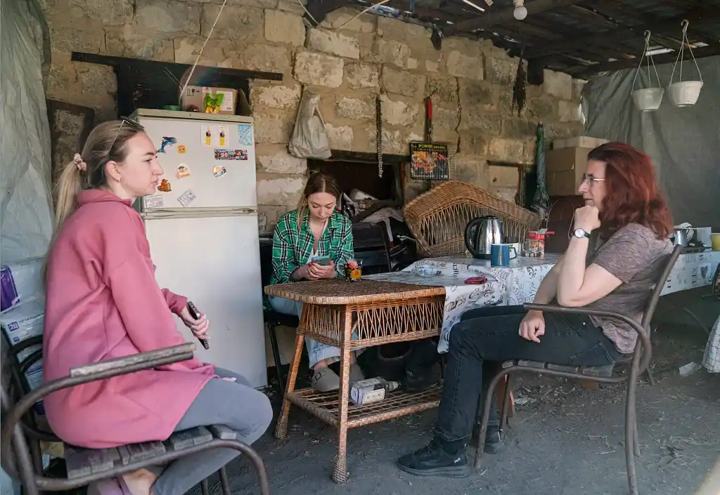 Anna interviewing villagers